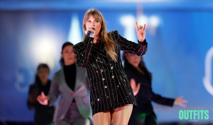 Taylor Swift wearing a black blazer on her Eras Tour 